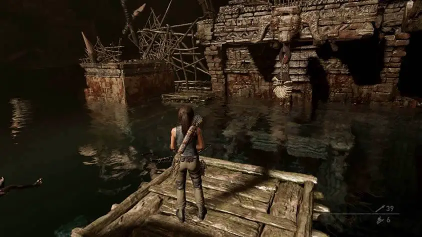 Lara em cima de uma jangada em Shadow of the Tomb Raider