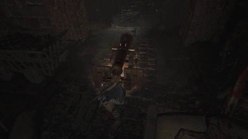 Lara empurrando um canhão em Shadow of the Tomb Raider